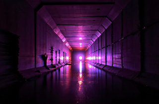 Illustration for article titled Unreal photographs of tunnels look like portals into the underworld